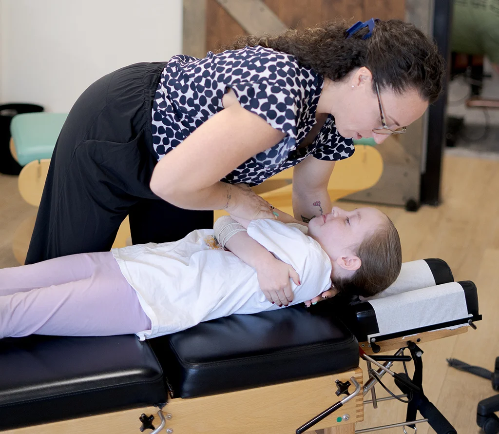 Chiropractor providing gentle child chiropractic care at the Temecula office