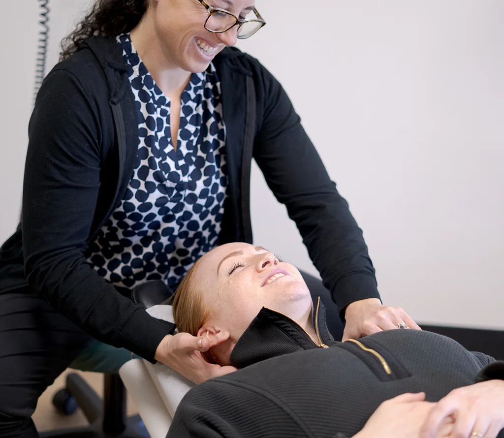 Chiropractor providing neck treatment for a patient at the Temecula chiropractic office