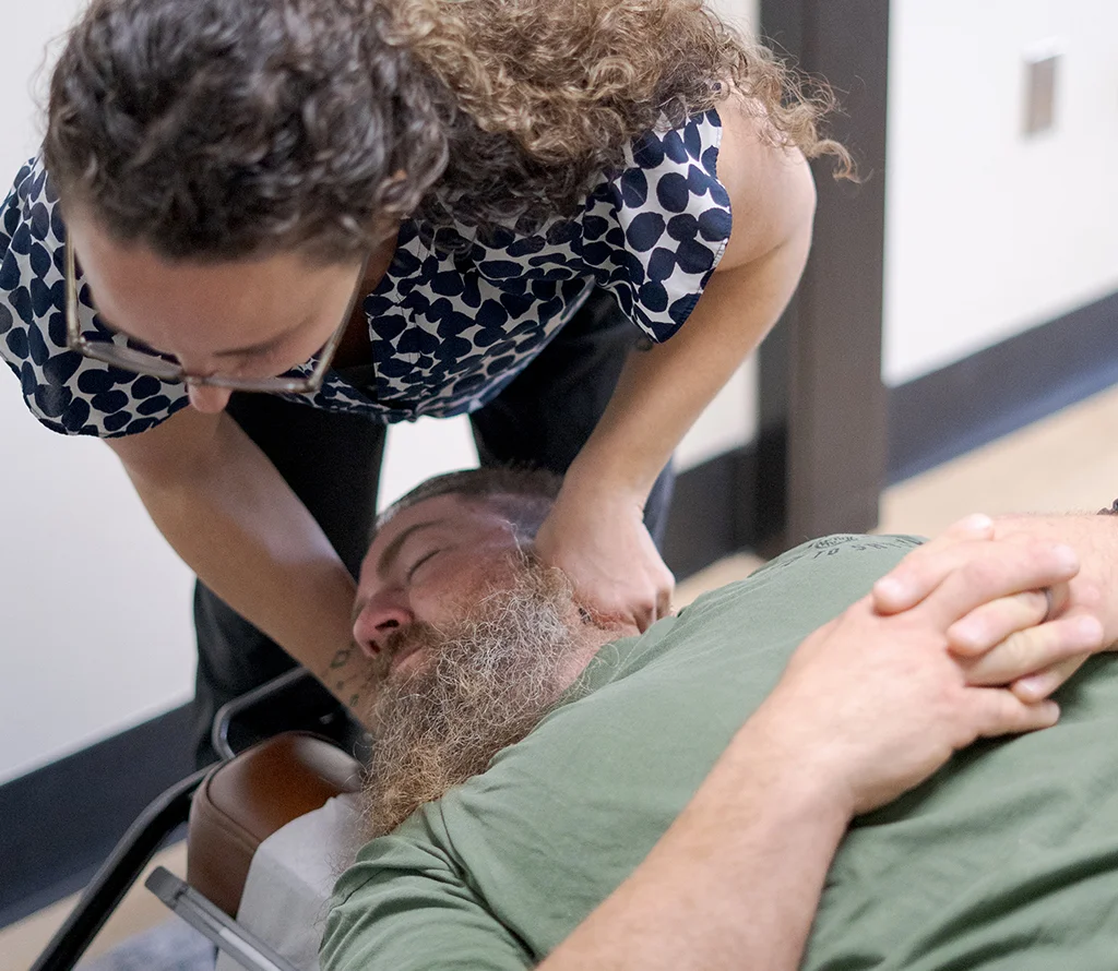 Chiropractor performing a neck adjustment for a patient at Trailhead Family Chiropractic Temecula