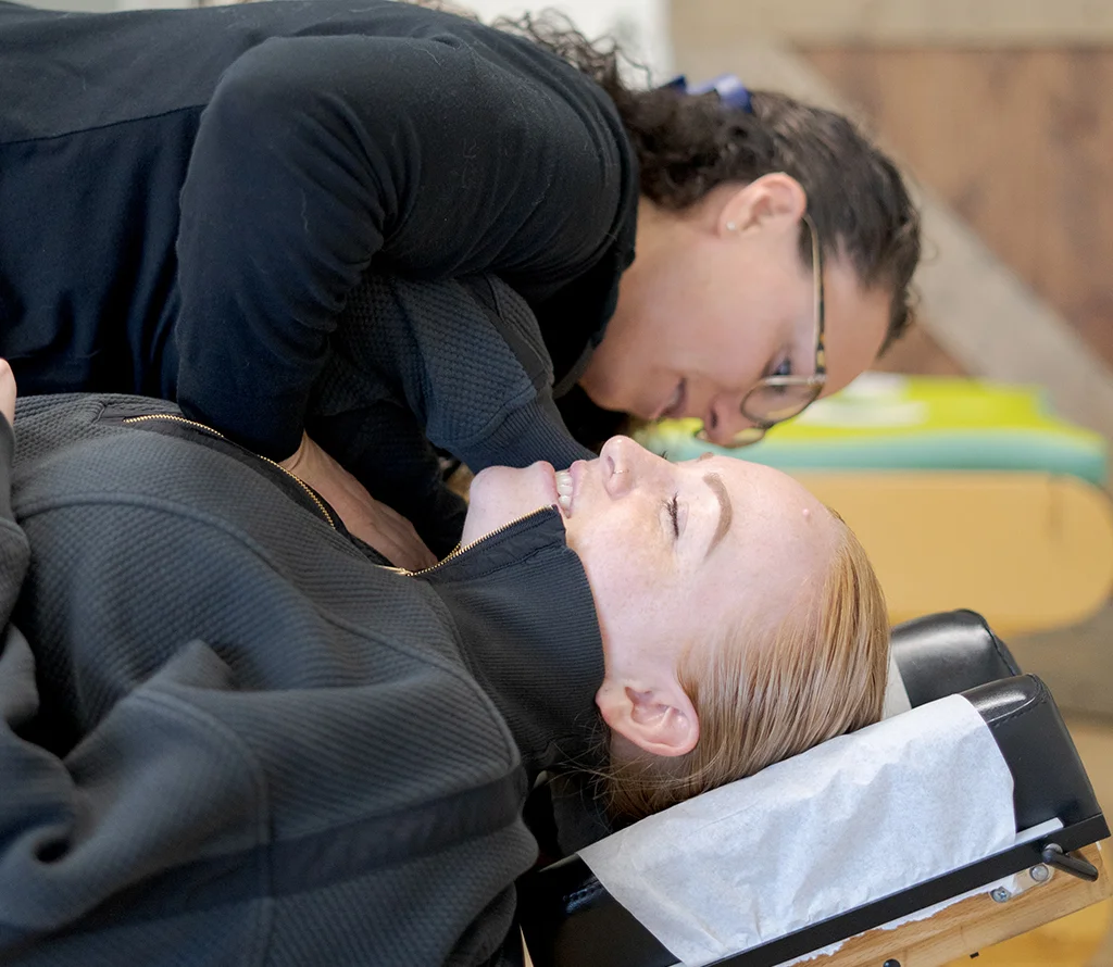 Trailhead Family Chiropractic provider caring for a patient in the Temecula treatment room